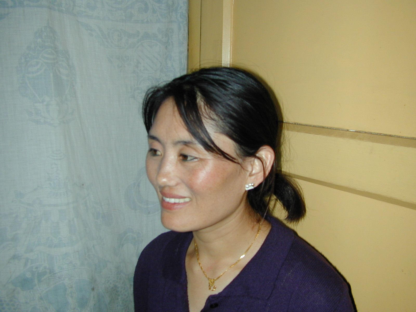 A Tibetan woman at h